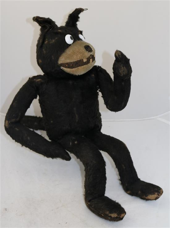 An early black plush straw filled model of Felix The Cat, 18in.